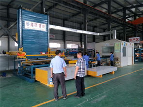 东莞三通板业码垛机器人净化板设备安装完毕投入生产